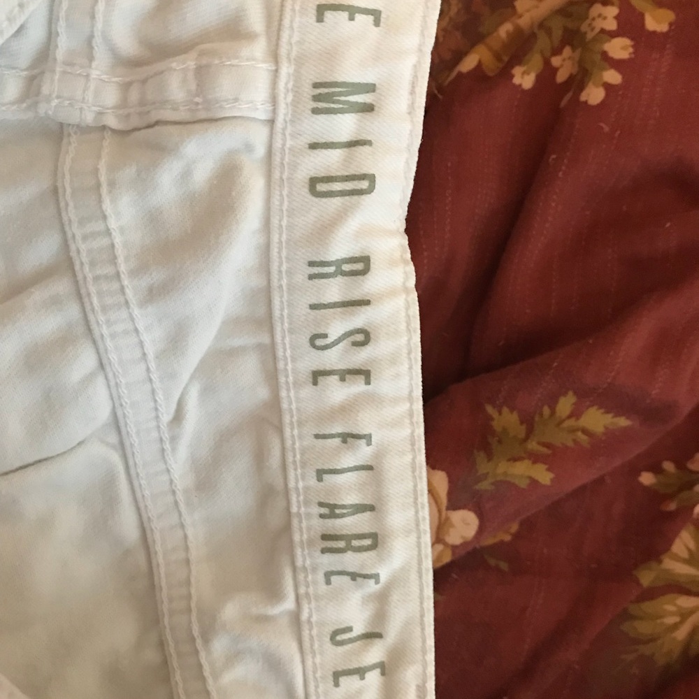 White flared pants